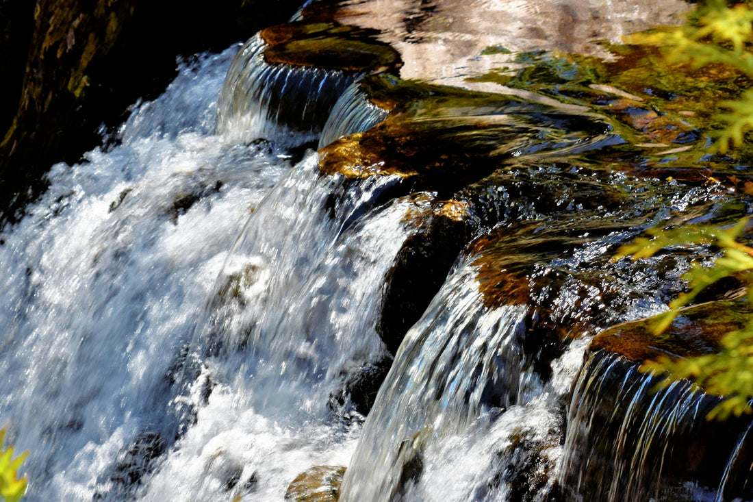 water flowing from waterfall