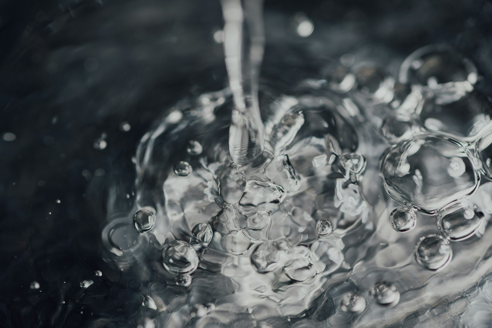 water droplets on body of water